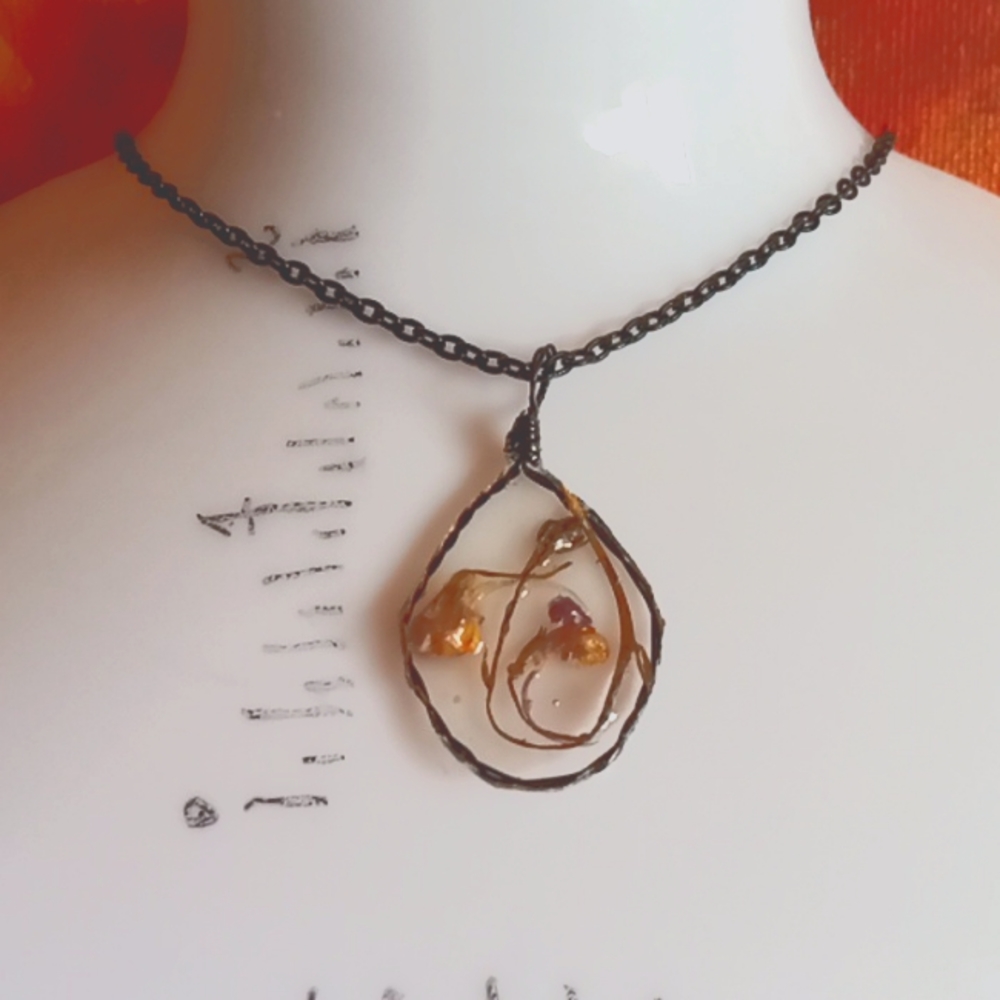 Floral necklace, amulet